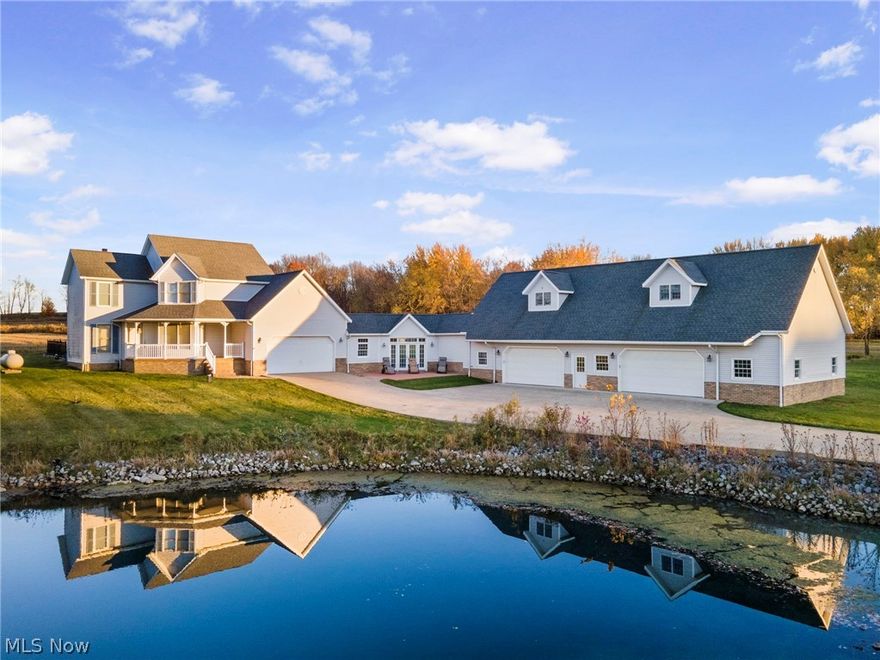 This home has been carefully crafted for YOU! The combination of Premium Materials and Impeccable Workmanship you'll find here is UNMATCHED.
The First Floor of the Main Home is comprised of an Eat-in Kitchen, Living Room, Office/Bedroom, and Full Bath. White KraftMaid Cabinetry & Quartz Countertops keep the Kitchen Bright and Classy, and the Quartz Waterfall serves as your Dining Area. For Poolside Drinks in those Summer Months, or something to warm you up through Winter, A Conveniently located Wet Bar rounds out the highlights of Your Brand New Kitchen! Upstairs you will find the Swank Master Suite, Laundry Room/Full Bathroom, & Third Bedroom. The Master Bathroom reveals a Shower for Two which has been laid out Elegantly with Stationary Glass, Custom Tile, and Dual Shower Heads.
Traverse the breezeway to the Additional Living Suite, located above the Attached Auxiliary Garage. This 1200 Sqft Suite was completed in 2021, The full demo and rebuild includes Hardwood Soft-Close Cabinetry, Dazzling Granite Countertops, and Black Stainless Steel Appliances. More Stunning tile work in the Bathroom, which doubles as the Laundry Room. Adjacent Living Room & Bedroom lead to the Massive Walk-In Closet to round out this Beautiful Suite.
In-Ground pool with Diving Board! Fenced-In-Yard! Private Pond! Attached 2-Car Garage + Heated 14-Car garage w/ 12' ceilings!