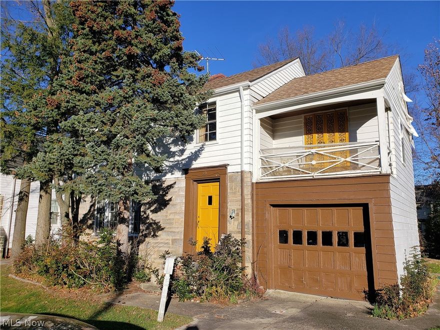 This home is a diamond in the rough! Convenient location, spacious rooms, convenient layout, beautiful original woodwork - and so much more! The front foyer entry leads to a spacious living room, complete with a large picture window and a beautiful fireplace. Off of the living room is a gracious dining room, which has access to the back enclosed porch and also to the kitchen, which has a charming  breakfast nook. There is also a powder room off of the stairway to the attached garage. The second floor has four bedrooms and a full bathroom. The basement has a deco fireplace in the partially finished side, and mechanicals and laundry in the other half. The back yard is large enough for cornhole, barbecues, volleyball, and you will enjoy both shade and sun. Call to set up a time to take a look!