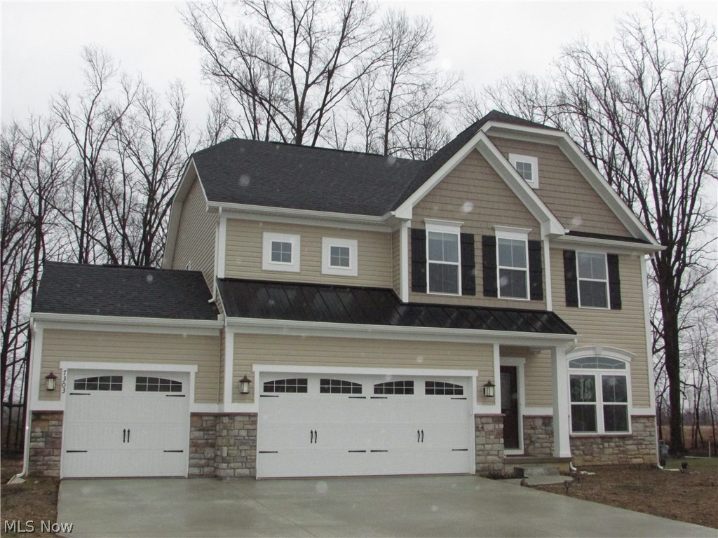 A spacious 4 bedroom, 3.5 bath colonial ( less than one year old ) with an open floor plan in the desirable Sandy Ridge Subdivision. This home sits on nearly an acre, and is adjacent to a 400 acre nature preserve, to which the neighborhood attaches with a walkway just a few feet away. The open kitchen features granite counter tops, a huge island, upgraded flooring, upgraded maple cabinets, stainless steel appliances, pantry, and a sunroom. An amazing fireplace highlights the family room that is completely open to the kitchen and sun room, sharing the natural hickory wood floors that run throughout the first floor. A formal living room/office is also on the first floor. This home has a finished basement with an additional 600+ square feet of living space, a full bath, and ample storage. A 20x15 master bedroom opens to a gorgeous bathroom with double sinks, glamour bath, and an amazing glass shower. Each of the bedrooms is large, and there is a second floor laundry. A 3 car garag
