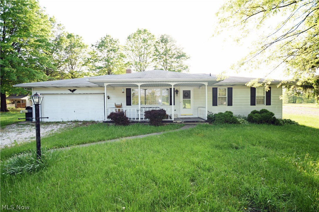 Cozy Ranch style home featuring 2 bedrooms and 2 full baths. The spacious eat-in kitchen has a wood burning stove and sliding glass doors that lead to your 3-season room. First floor laundry allows for complete one level living. Need more space? The large open basement has tons of potential. Situated on a beautiful 1.75 acre county lot with 2 car detached garage. Tons of potential! Comes with America's Preferred Home Warranty! Call Today!
