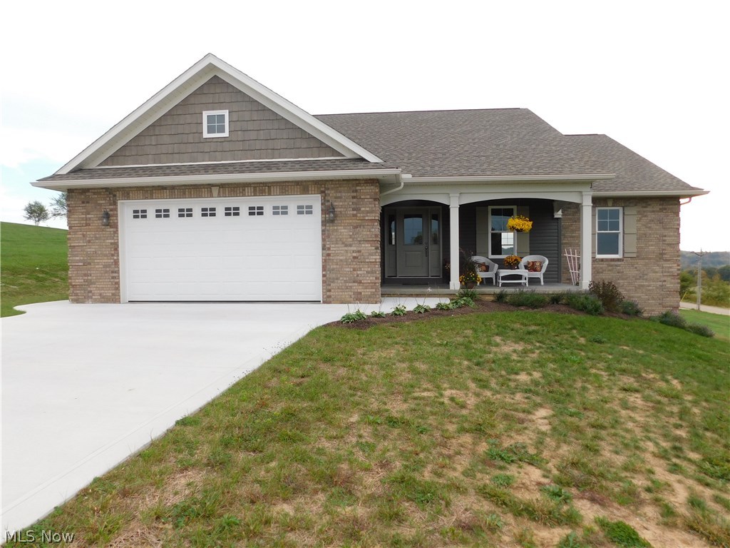 MOVE TO A COUNTRY SETTING AND A CRAFTSMANSHIP NEW CONSTRUCTION HOME! AND ALL THE QUALITY WORK HAS BEEN DONE FOR YOU! THIS 3 BEDROOM, 2 FULL BATH CORNER LOT HOME IS ON 1.4 ACRES IN WEST ACRES SUBDIVISION AND HAS A BREATHTAKING VIEW OF THE COUNTRYSIDE FROM YOUR FRONT PORCH. WHEN YOU ENTER THROUGH THE FRONT FOYER THE HOME OPENS UP WITH BEAUTIFUL WOOD FLOORING, CROWN MOULDING AND A LIGHT FILLED GREAT ROOM/DINING ROOM THAT IS OPEN TO EAT-IN KITCHEN/DINING AREA. THE CRAFTSMAN AMISH BUILT KITCHEN HAS A LARGE GRANITE TOPPED ISLAND FOR GATHERING AND ENTERTAINING. THE GREAT ROOM HAS ACCESS OUT TO THE REAR DECK FOR ADDITIONAL ENTERTAINING AND RELAXING. THE PANTRY IN THE KITCHEN HAS AN AUTOMATIC LIGHT WHEN DOOR OPENS. MASTER SUITE HAS A LARGE WALK IN CLOSET AND BATHROOM. THERE ARE SO MANY QUALITY UPGRADES IN THIS HOME INCLUDING GRANITE, STAINLESS, CAN LIGHTING, SELF CLOSING CABINETS AND MANY MORE FOR A MUST SEE ON YOUR NEW HOME WISH LIST. LIVE IN THE COUNTRY BUT ONLY MINUTES FROM I70. SCHEDULE T