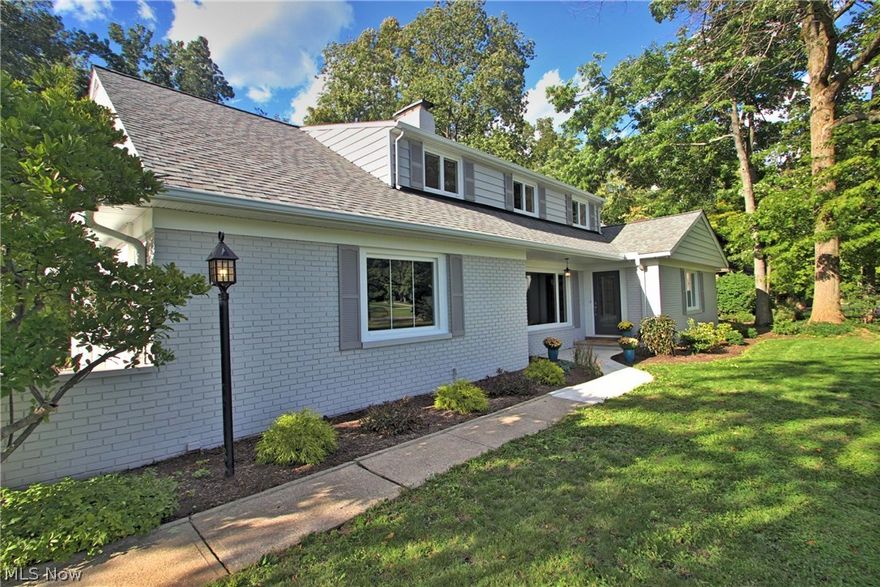 Custom Home meticulously rebuilt/remodeled from top to bottom in 2016. High quality materials used throughout. Open first floor plan great for entertaining! High end new Bosch kitchen Wellborne maple soft close cabinetry, granite counter tops, breakfast bar, recessed & pendant lighting. Stunning first floor master suite w/ gorgeous master bath, Carrara marble counter tops, over-sized custom shower, soaking tub, double sinks & private toilet. Extra large walk in master closet w/ custom closet system. Rebuilt marble wood-burning/gas fireplace, built-in cabinets & floating glass shelves in living room. Family room overlooking the expansive wooded rear yard, w/ new custom sliders to deck & patio. Large first floor mud/laundry room w/ custom cabinetry. Contemporary barn doors & new entry doors, new Pella sliding doors. New solid oak hardwood floors. New trim and crown molding. New drywall, New paint throughout. Reconfigured second floor w/ 2 full baths, tile showers, granite counter-tops, 3