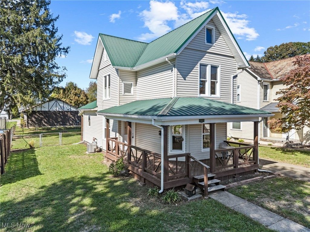 Photo of 402 4th Street NW, New Philadelphia, OH 44663 (MLS # 5164805)
