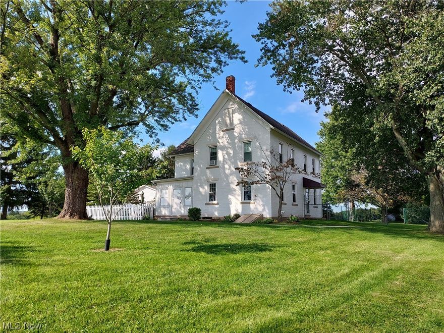 Don't let this beautiful, well maintained century home pass you by.  Home has many recent updates including, repointing and painting of the brick on the exterior of the home, newer windows, septic, A/C, and concrete patio.  Exterior walls have been insulated and new drywall.  The home has french doors that lead into an updated spacious kitchen and bathroom on the main level.  The main level also includes a parlor and living room.  The upstairs has 3 bedrooms and another full bath with an attached dressing room.  All the rooms on the second level have hardwood floors under the carpet.  The basement has glazed tile with a laundry area and plenty of storage.  All of this sits on a hill with amazing country views on almost 2.4 acres of land with plenty of trees.  Schedule your showing today.