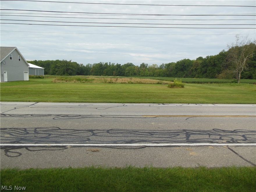 Peaceful country lot.  Faces east with beautiful sunsets and surrounded by farm land.  Great opportunity to enjoy country living close to I-90.