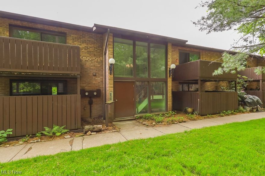 Outstanding opportunity to live in The Woods of Brecksville's 2-bedroom 1.5 bath condo set in this wonderful wooded setting! This unit has a large Living Room with an attached back deck overlooking woods and open to the Dining Room. Spacious Master Suite has two walk-in closets, master bathroom, and access to an extra large covered deck. Second bedroom also has a large walk-in closet. This unit comes with a 2 car garage and a lower level private storage room.  Located close to I-77 and the Turnpike it is an easy drive to Downtown Cleveland or Akron.  Enjoy the Shopping, Recreation Center, Senior center, Library, Cuyahoga National Park, and Top Rated School System that Brecksville has to offer. Condo to be sold As-Is. Seller to make no repairs.  Schedule your private tour today!