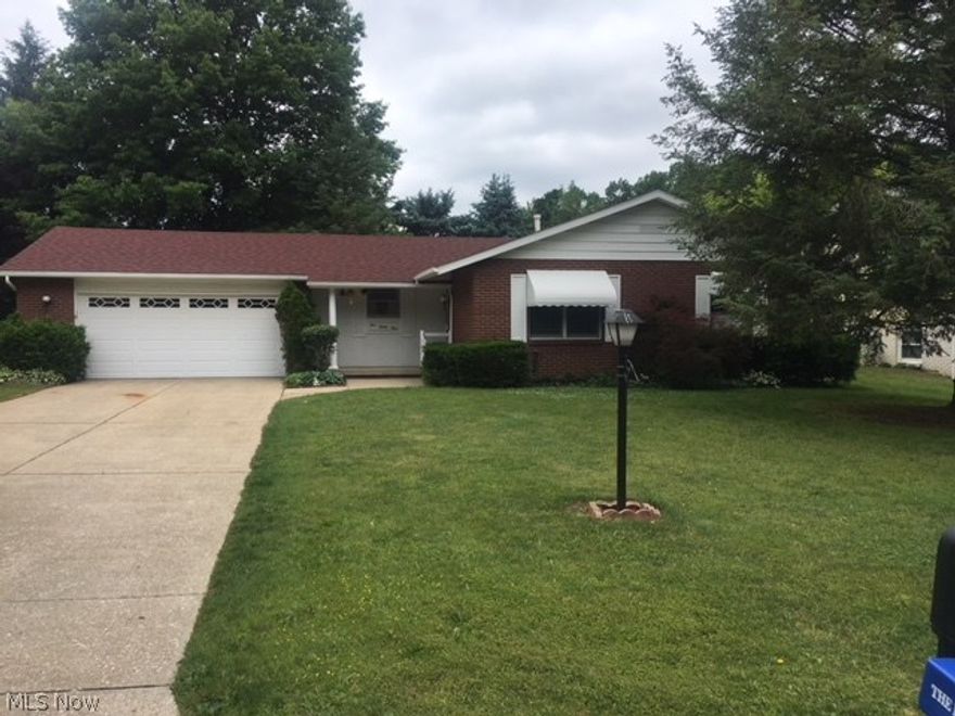 1252 sq. ft. Conventional Ranch style home with 3 bedrooms, 2 1/2 baths, full partially finished basement, 2 car attached garage, family room in lower level, and a 3 season sunroom.  Paved driveway, city water and sewer.  Needs some updating but has good solid bones.
