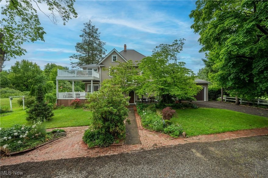 Welcome to your own private retreat! This beautifully updated 4-bedroom, 3-bath home sits on 2.4 landscaped acres right next to Mosquito Lake Park, offering direct access to nature, peace, and privacy. Enjoy a unique combination of charm and modern updates, starting with a metal roof, brick and stone walkways and a wraparound composite deck with views of the park. Outdoor features include a tennis court, an above ground swimming pool, with both an attached two car garage, and an detached 2 car garage with a loft, providing plenty of space for storage, vehicles, or hobbies. There is an additional 2 car lofted garage on the property. Inside you'll love the updated , modern kitchen with stainless steel appliances and stylish finishes.  The kitchen and eat in dining area features a beamed ceiling and sliding glass doors to the deck, making it perfect for entertaining. A spacious living room showcases beautiful woodwork throughout and a gorgeous staircase that adds to the home's classic character. There is a first floor laundry with an attached pantry for convenience. The primary suite includes a private attached composite deck, a walk-in closet, a remodeled bathroom, and a sitting area for your own personal retreat. Bedroom feature hardwood floor and a finished attic, offering a bonus bedroom or flexible living space. Major updates include a new furnace, [2024] and electrical system [2024].  Plus, the property has a gas well that provides free gas and royalties, a rare and valuable perk!  This home truly has it all: space, charm, updates, and a one of a kind location. Don't miss your chance to own this incredible property with access to the beauty and recreation of Mosquito Lake Park. Let your imagination run wild...this home would be perfect for an AIRBNB!