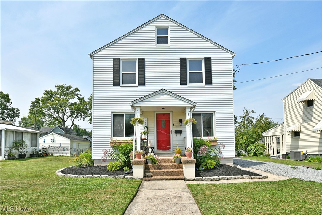 What do you get when comfortable coziness and colorful charm run together? This darling, two-story Niles residence might be your closest answer! Welcome home to casual living as you explore the three-plus bedroom layout and all of its unique beauty. Did we mention curb appeal? Stone trimmed mulch beds wrap the home as the manicured sidewalk leads to a pillar-lined covered porch where a bold, red entry door creates the perfect focal point. The driveway stretches past a second, covered rear deck where you can grill and relax just the same, all before finding a common cross street for easy entry and exits. Step inside to be greeted by a sun-washed living room, featuring carpeted flooring and a spacious layout. An arched threshold reveals the nearby dining room where warm hardwood flooring fills the illustrious layout. Around the corner, take in the handsome kitchen that pairs butcher block styled countertops with a white tiled backsplash for a modern, country feel. Stainless appliances add to the flavor while a corner pantry awaits the basement entrance. Meanwhile, first floor laundry hides away in a large bonus room. Upstairs, the landing flows into the main hall where additional hardwood flooring continues throughout the bedrooms. The trio of inviting accommodations maintains the theme of large windows and plenty of natural light, all trimmed in stained woodwork. Bonuses include a walk-in closet and access to the full third-floor attic. At the end of the hall, an updated (2020) full bath is highlighted by a sleek shower and modern vanity. Downstairs, the basement offers partially finished rec space, additional storage, and a lower half bath with plenty of room for easy expansion. Updates include: roof 2024, windows 2024, air conditioning 2020, wood floors sanded and refinished 2025, kitchen remodeled 2025, basement half bath added 2025, and so much more, plus a one-year home warranty!