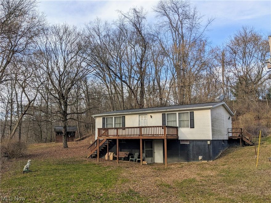 Quiet, country setting on 2.29 acres not far from town conveniences. This ranch home sits in a beautiful, private setting surrounded by mature trees and comes with a built-in generator, large living room and full, walk-out basement. Basement is partially finished with a half bath and could be finished for additional living space. Hot water boiler heat that has been serviced twice per year by Uhl Plumbing. Generator was serviced several times per year by Millersburg Electric. Lots of deer and other wildlife can be seen on this property. Property is being sold as-is.