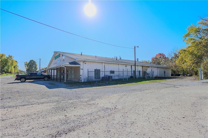 Spacious 21,210 sq. ft. commercial complex for sale on 1.52 acres. Was used for manufacturing and has offices, lunchroom, and restrooms plus loads of open space. Fenced-in back area.  16 ft. ceilings in main areas of the buildings. Main building is 15,600 sq. ft. and other building is 5610 sq. ft. 3 phase 440 amp. electric service. Many uses and great possibilities. Located near St Rt 62.