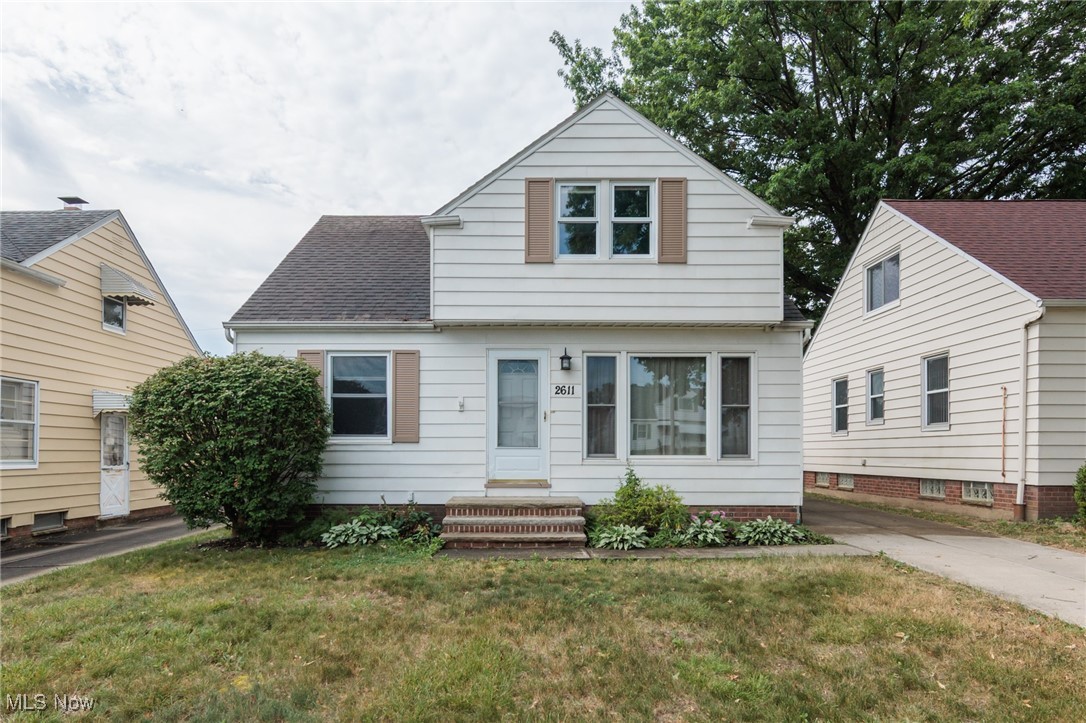 Welcome to 2611 Klusner Ave in the heart of Parma! This charming 4-bedroom, 2-bath bungalow offers 1,650 square feet of comfortable living space, including a partially finished basement perfect for a media or rec room. The main floor features two bedrooms, a spacious living room with laminate floors, and a large eat-in kitchen with vinyl/LVT flooring. Upstairs, you'll find two additional bedrooms with wood floors and a full bath. Enjoy the convenience of central air, a detached one-car garage, and a fully fenced backyard ideal for relaxing or entertaining. Located on a quiet street just off State Road, this home is close to parks, schools, public transportation, and shopping. With all appliances included—washer, dryer, refrigerator, range, and dishwasher—this home is move-in ready and waiting for its next chapter. Don’t miss this great opportunity!