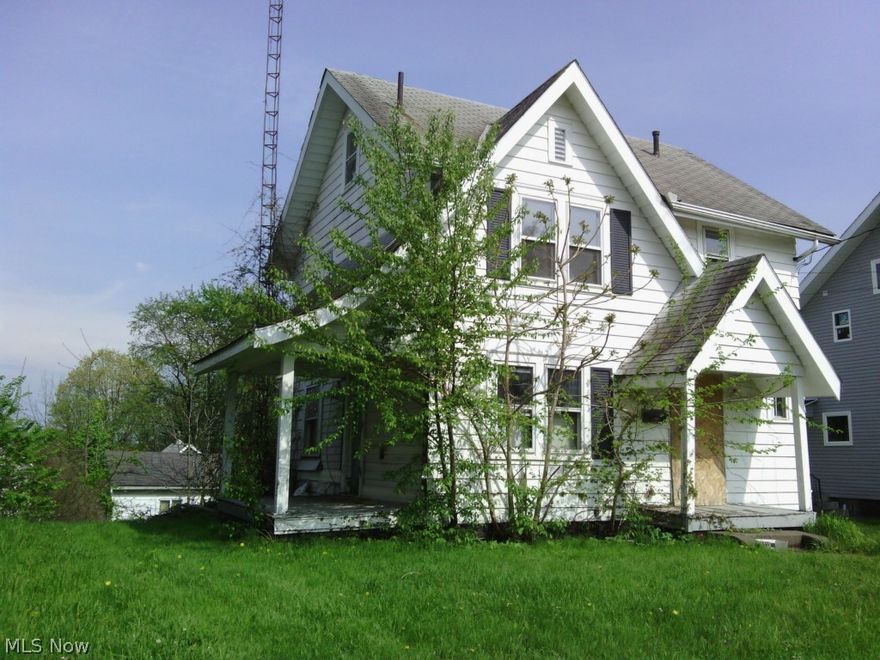 This unique property is a great investment opportunity.  Two houses on one parcel: a two-story, 3 bedroom, 1 bath property and a 1 story (ranch), 2 bedroom, 1 bath property, with two car garage below.  Both houses are in need of repair.