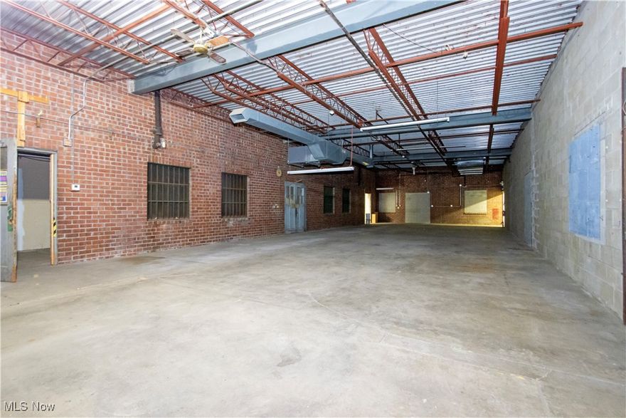 Open 2900 SF warehouse space with additional 537 SF loading dock area.  High ceilings, roll up dock doors and brick facade creates an inviting atmosphere.  The space can be built out into many different types of business use - retail, restaurant, office, warehouse.  Great location close to downtown Wooster and accessible to route 30 interchange.  Good parking and exposure. Exterior of building is receiving a complete facelift in 6-8 weeks.