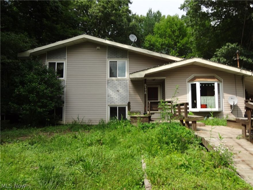 Four-level split home, three bedrooms, 1.5 baths on 10 acres.  Partial basement, family room and third bedroom on the next level up.  The master bedroom was two bedrooms and redesigned to be a large master with a walk-in closet.  There is a three car detached garage and a shed.  There was a fire in the house in the mid 2,000s.  Newer electrical and repairs from fire were made.  Home needs TLC.  Buyer will be responsible for septic update/replacement per the Trumbull County Health Department.  Condition of furnace not known.  Selling the property in its "as-is" condition.  Estate.