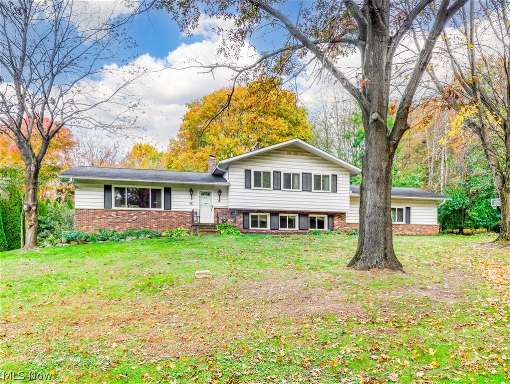 Charming Split Level with 4 bedrooms and 3 full baths in a popular neighborhood in Green. Well built. Foyer entry opens to the formal living and formal dining with vaulted beam ceiling and sliders leading to the large deck porch overlooking the beautiful backyard. Lovely eat in kitchen with beautiful maple cabinets and tile backsplash. Cozy family room with fireplace with sliders to sunroom. The hot water radiant heating system is an excellent source of heat, it is economical delivers a consistent and even heat. Seller offering home warranty for extra peace of mind.