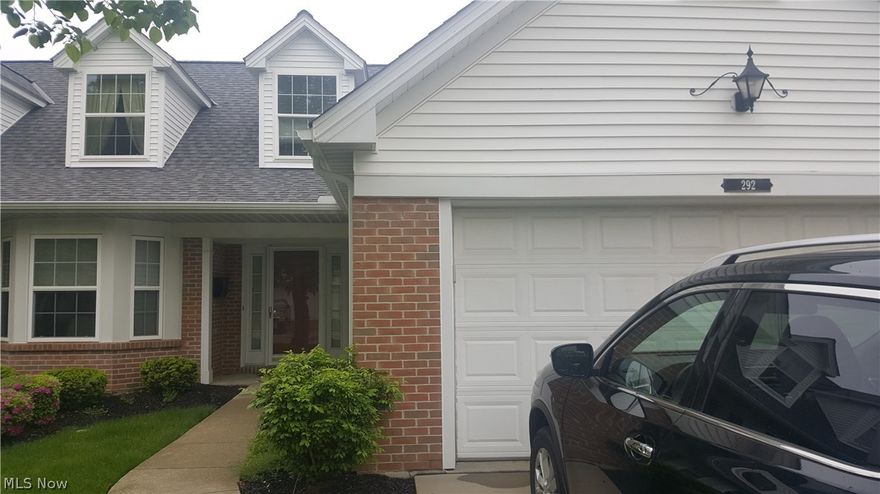 Welcome to this spacious and low maintenance home in the sought after community of Brookside. Enter the welcoming two story foyer with elegant chandelier and hardwood floors. Continue on into the large great room featuring a gas fireplace and vaulted ceilings that truly make the room feel open and airy. Off the great room is a delightful sun room bonus space. The generously sized kitchen with breakfast bar provide ample storage and prep-space for all your cooking needs. Finishing up the first floor is the sizeable master suite complete with walk-in closet, private bath with double sink vanity, walk-in shower and soaking tub. Head upstairs where you will find two bedrooms and an additional full bath. In the summer enjoy some fresh air in your private backyard with patio and in the winter park your cars in the attached garage and never worry about brushing off the snow again. Other features include a first floor powder room for guests, laundry room with wash sink and tons of storage thro