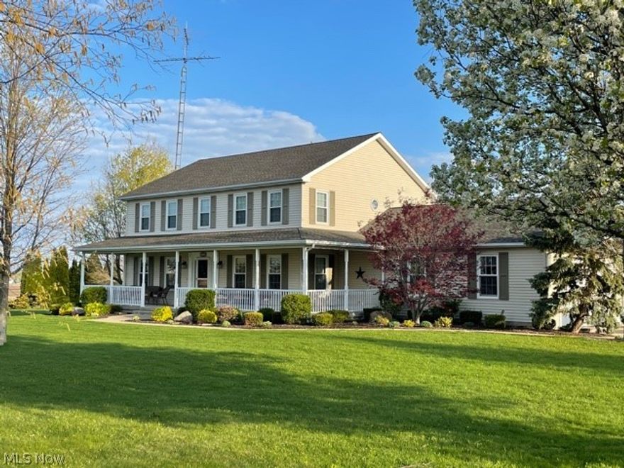 1ST TIME EVER ON THE MARKET!! This one-owner custom-built home, w/ 2x6 framing, on 5.2 acres was thoughtfully designed & well-maintained! Enjoy the views from the nearly wrap around, extra wide, covered front porch w/ plenty of room to entertain. The 1st floor offers an open floor plan betw the spacious kitchen w/ Suhr Kitchen solid oak cabinets, updated hardware, large island, newer SS appliances that convey. 2 dining areas, a front room that's perfect for a home office, living room, bright sunroom w/ skylights & vaulted ceiling, walk-in mudroom & 2 updated half baths round out the main floor. Enjoy the natural flow to the indoor & outdoor living spaces, which also include a spacious, completely screened back porch that overlooks the gorgeous,  well-manicured acres of land. 2nd floor features a large master suite w/ his & her closets, ensuite bathroom w/ garden tub & separate shower. Convenient 2nd floor laundry room,  3 generously-sized bedrooms & large full bath. Large, open finisha