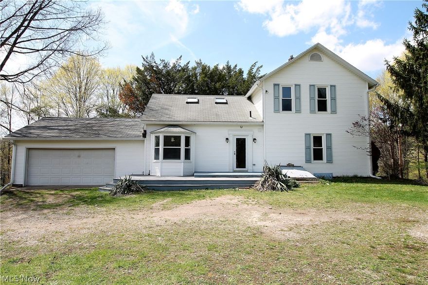 Historical appeal in charming four bedroom, two full bath colonial home surrounded by 2.69 acres. This beautiful home offers a large family room with original wood mantel fireplace, stunning bay windows to let the natural light to shine through, the first floor has laminate flooring (2020) and new ceiling fans (2021) throughout. The dining room leads to the sun room which has sliders to the pristine outside. The bright kitchen offers stainless steel appliances, eat in area, built in shelves, plenty of cabinets. Also on the main level there is a master suite and full bathroom. Upstairs you will find two more bedrooms and a full bathroom. As you go up another set of stairs you will find another bedroom which could easily be an office, rec room, etc. There is a full basement with laundry area. Two car attached garage with new door opener (2021) and electric. The stunning acreage offers so much seclusion to this fabulous home and so much room for  gardening, entertaining outside or just re