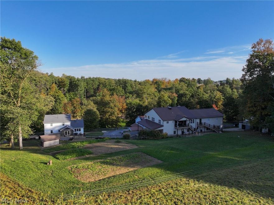 Excellent 5-bedroom home on 6.1 acres located 3 miles outside of New Bedford. Over 3,200 sq. ft. of living space in the home with replacement vinyl windows, large open kitchen with an eat in island. Master bedroom and bathroom located on the first floor. Finished kitchen on the lower level with a ½ bath also located in the basement. The 3-story shop building with over 4,700 sq. ft. on the main level, includes a loading dock, office space, break room, ½ bath and large manufacturing area. Upstairs is a 2-bedroom 1 bath open concept apartment with a beautiful deck. Lower level also has an overhead door and is currently used for storage and utilities. The entire shop is wired and has in the floor and radiant NG heat. The shop building should lend itself well to multiple uses thanks in part to the size and access on CR 59. Included on the property is a bank barn with 4 box stalls and fenced in pasture. Auction live bidding on Wednesday April 10, at 6 PM, Woodworking equipment will be sold on April 12 at 10 AM