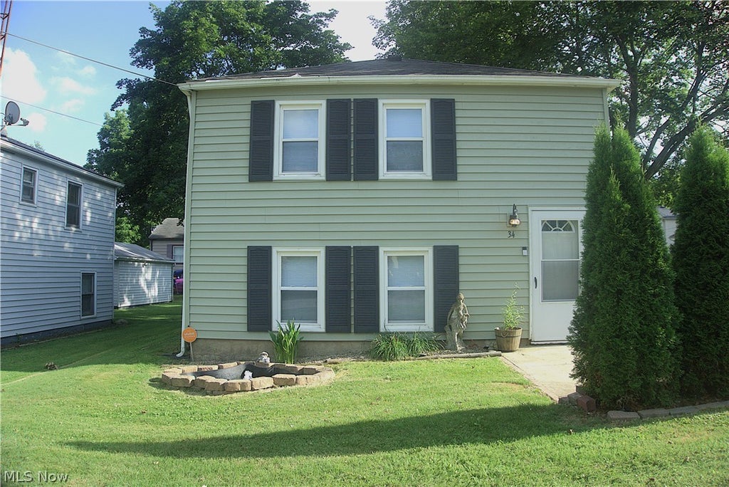 Photo of 34 Kenmore Avenue, Barberton, OH 44203 (MLS # 5224147)