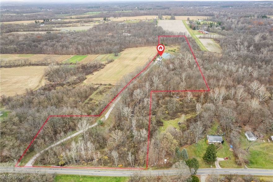 Escape to your own private sanctuary nestled on 13 acres of picturesque land! Whether you're an avid hunter or simply seeking a peaceful, private retreat, this property has it all. The home boasts 3 bedrooms and 2.5 bathrooms, with a first-floor master suite complete with a walk-in closet and en-suite bathroom featuring a garden tub. A charming loft area overlooks the living space and leads out to a walkout balcony, providing stunning views of the surrounding landscape. The kitchen is a chef’s dream with beautiful hickory cabinetry, a walk-in pantry, and ample counter space. You'll also appreciate the convenience of the first-floor laundry room. The home is equipped with modern updates including a geothermal heating system (replaced in 2016), a newer roof, and 200-amp electrical service. Outside, the property is equally impressive featuring a 1,000-foot driveway that has been recently resurfaced, leading you through the peaceful, wooded surroundings to the home. A pond with a fountain adds to the serenity of the setting, while chicken coops and a large 26x56 heated pole barn (with a newer furnace and concrete floors) offer endless possibilities for hobbies, farming, or storage. If desired, there are 35 contiguous acres available to purchase (See MLS# 5087636). This is more than just a home—it's a lifestyle. Enjoy the peace and privacy of rural living, all while being just a short drive from town amenities. Whether you're hunting, gardening, or simply soaking in the views, this property offers everything you need for a fulfilling, self-sufficient life.