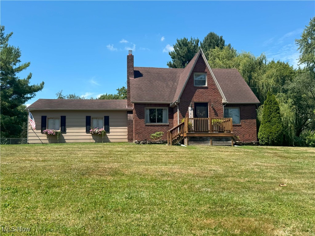 This is your chance to be right next to Poland with 95 Clingan Rd.! It's a 3-bedroom home right on the Poland/Struthers line, but without the taxes! This inviting house is perfect for entertaining with a .70 acre, fenced in lot, semi-inground pool (2022) with built around Trex decking, patio and newly redone asphalt driveway (2024). You’ll enjoy this serene area with a dead-end street off to the left and the Mill Creek Preserve directly in front of the home... and you may just have a visit from deer behind your yard every night! When not spending time outside, come inside and you’ll be stunned with this completely remodeled kitchen with white cabinets, crown molding, granite countertops, bronze stainless appliances (2022) and waterproof vinyl flooring (2024). The dining room has an updated chandelier and beautiful original hardwood floors. The living room is tastefully updated with wood plank accent wall, woodburning fireplace and entranceway to the front with new screen door (2025). There’s also a first-floor bedroom that’s currently being used for an office with a TV and mount that stays! Upstairs are 2 more generous sized bedrooms with original hardwood floors as well! The primary bedroom has 2 closets, one being a walk-in closet in addition to an abundance of storage in the dormer area. A full bathroom with shower completes the second floor. The basement hosts the laundry area with new oversized washer and dryer that stay, new utility sink, a workshop area and tons of storage space! Other updates include A/C (2023), Hot Water Tank, French drain (2024), sump pump (2025), and house windows (2011). Just 2 minutes away from shopping, dining and gas in Poland! This one is move-in ready and an absolute MUST see!