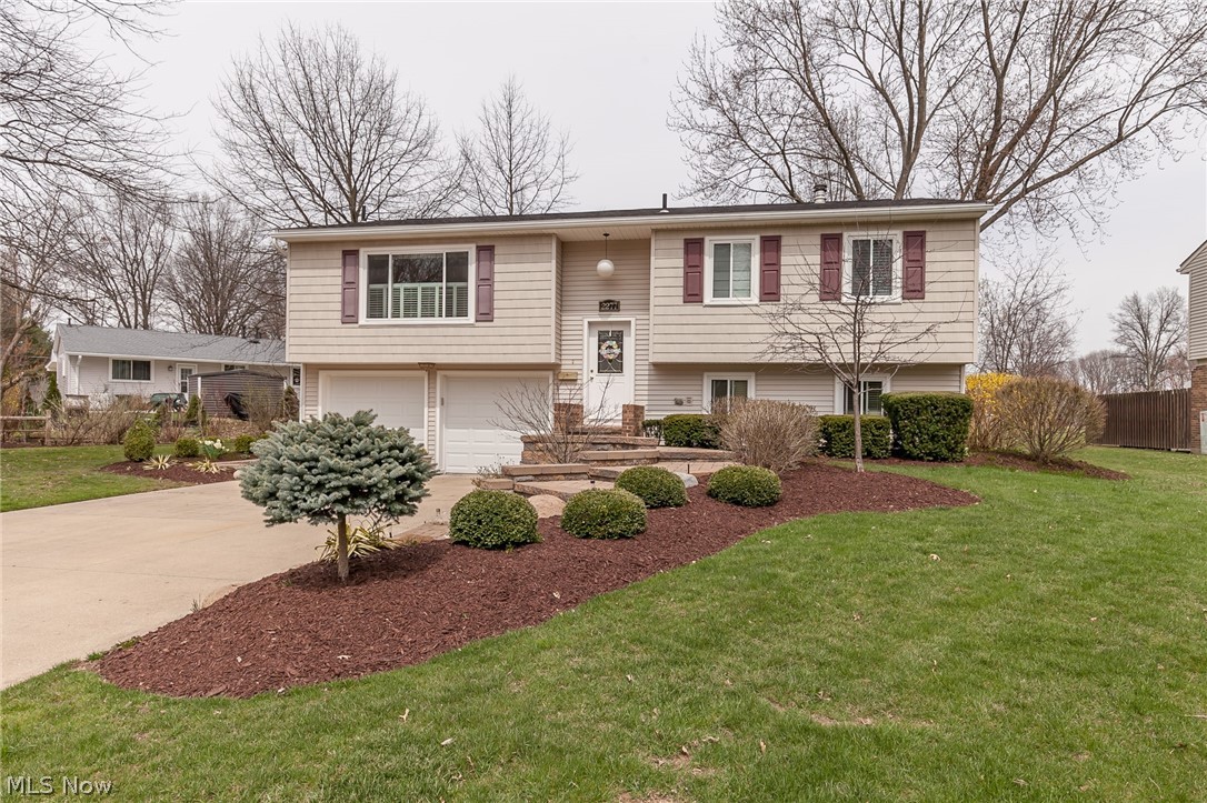 An exquisite Stow bi-level with 3 bedrooms, and 2 full baths. This beautifully landscaped home features an all brick walk way to the front door, and a stone walk way to the rear. The many updates include roof (2014), electric (2018), air conditioning (2013), appliances, windows, siding, and so much more. The main bath has been updated, and has a HEATED FLOOR!. The large living room opens to a large deck. There is a 2 car garage, full laundry room, eat in kitchen, additional living space (with full bath) in the lower level, and so much more.