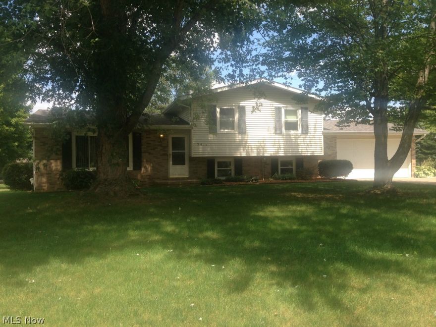 Nice split level setting on 90x244 lot. 3 bedrooms. 1 1/2 baths. Eat in kitchen with great cupboard space and ceramic tile floor. Formal dining room overlooks patio and backyard. Master bedroom has entry to main bath which has new tub and commode in 2013. Family room with wood burning fireplace. Utility room has nice storage and half bath. Crawl space under living room and kitchen. 2 car garage with 2013 new opener. More updated items include roof shingles and gutters (2008), garage door (2002), new vinyl windows and glass sliding door (2005) and sump pump (2010). More pictures to come after tag sale August 8th and 9th from 12-5PM.