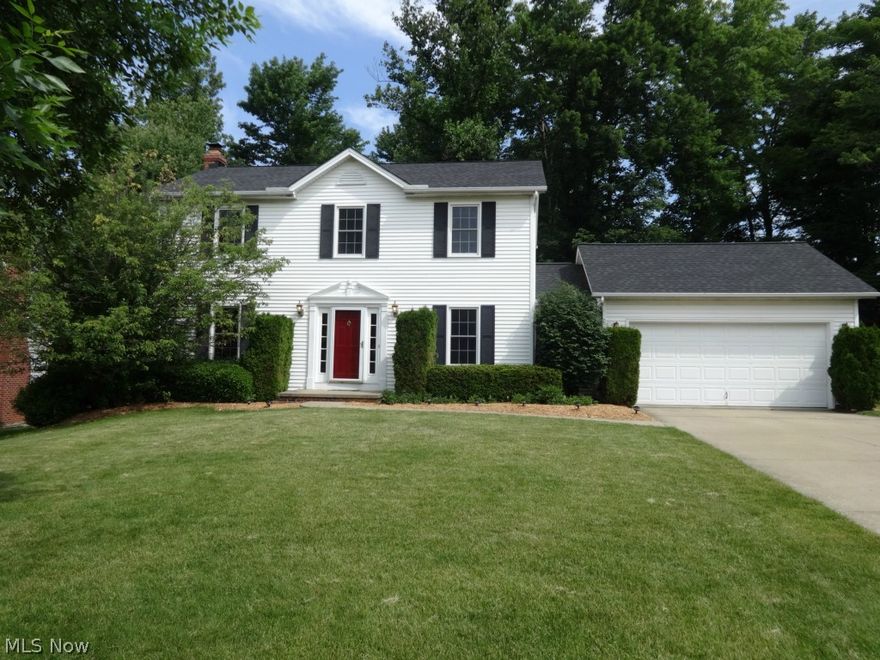 Rare Meadowood Colonial! You will love the great layout, open floor plan, & most of all, one of the best backyards! Fenced yard, partially treed, provides great space for playing & entertaining. Stamped patio! Play set! First floor has huge kitchen with lots of counter space, island, additional serving area & wired for surround sound. Updated 1/2 bathroom, bright separate laundry room with window,laundry tub & cabinets! Great Room, also wired for sound, has wood burning fireplace with blower,  & atrium doors that lead to the patio! Formal dining room. Second level features 3 bedrooms & 2 full baths!   Master bedroom with master bath (larger vanity, shower) and walk-in closet.  All good size bedrooms! Whole house wired for home networking!  Finished basement with lots of built-in storage.  1 year home warranty is included!  Immaculate and ready for you to move right in!  Enjoy Meadowood community!  All amenities of City of Twinsburg!   Won't last.  Call today!