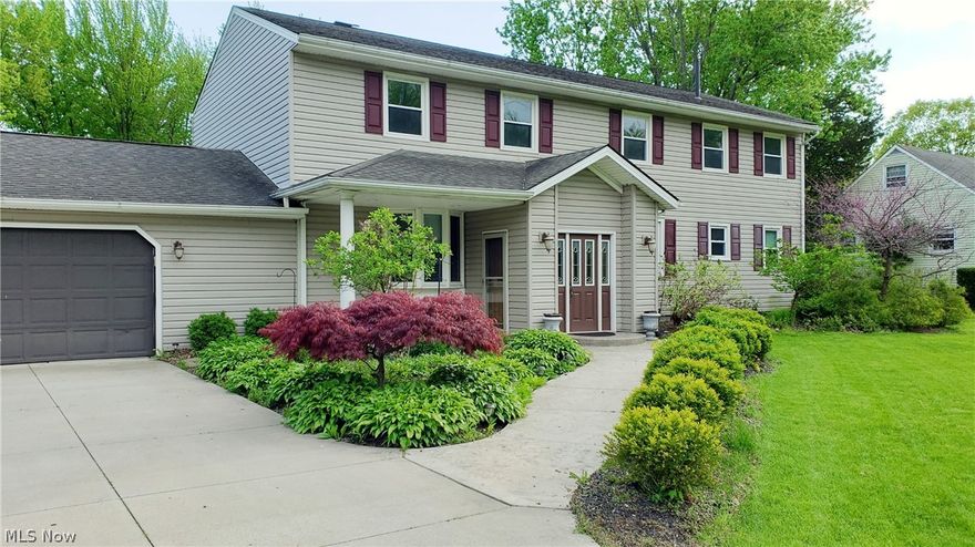 Fabulous colonial on over half an acre with gorgeous updates & incredible room sizes!  A small foyer welcomes those who enter, followed by a view of the open layout of the main living areas.  The kitchen is the highlight, espresso cabinetry accented by granite countertops & glass tile backsplash, stainless steel appliances & a large sliding door that opens to a deck overlooking the fenced backyard!  Laminate floors enhance the kitchen & extend into a dining room big enough to host all your extended family.  A utility room large enough to function as both a laundry & mudroom connects the kitchen to the oversized 2 car garage.  Also on the 1st floor is a huge bedroom & a beautifully updated full bath! The smallest room on the main level would make a great office, but having a closet, it could be a small 5th bedroom if needed. Upstairs the remaining 3 bedrooms are spacious & both bathrooms are updated.  The master bedroom boasts its own bath, a walk-in closet & a room extension where a dr