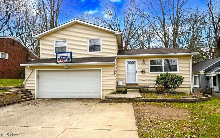 *Beautiful 4 LEVEL Split In Kent Showcases 2,250 Sq. Ft. Of Living Space Including 3 Bdrms, 1.5 Bathrms & Attached 2 Car Garage On .30 Acres! *Enjoy Summertime Sitting Outside & Hearing The Birds Chirp- So Peaceful. Almost Fully FENCED IN YARD, NO MAINTENANCE DECK, Brick PATIO, Garden + 2 Sheds! The 2nd Shed Has HEAT + ELECTRIC & Lean To *Wide Concrete Driveway For Plenty Of Guest Parking *Updates Include: CARRIER FURNACE & CENTRAL AIR 2021, Added SHED W/Electric + Heat, Completely REMODELED KITCHEN <5 Yrs, 2013 -ROOF, SIDING, Vinyl WINDOWS, Resurfaced Deck W/TREX & Vinyl Railing, Added 14x16 Brick Patio. Updated 150 Amp Electric Panel, Added Retaining Wall And More! *Walk In To The Main Living Rm W/Hardwood Floors & Double Vinyl Windows W/Upgraded Blinds For Natural Light *The Eat In Area Has New Grey Cabinets And Wine Racks Making A Great BUFFET BAR/Coffee Bar & Extra Storage W/Faux Marble Countertop & Slider To The Back Deck *Fall In Love W/The LUXURY REMODELED MODERN Kitchen Boasting Faux Marble 2 Part Epoxy Countertop, Grey Pullout Cabinets W/SOFT CLOSE Drawers, Black TILE BACKSPLASH, High End GE Profile SS Refrigerator W/Double Freezer, GE GAS STOVE W/Middle Griddle + Convenient Stainless Steel Above Range Pot Filler, SS Dishwasher, Touchless SS Faucet W/Cup Rinser & Microwave. All Appliances Stay! *Upstairs Are 3 Bdrms And A Full Bathrm W/Ceramic TILED Bath/Shower Surround, Oversized Handheld And Regular Rainshower Includes Aquabliss Filtration, Dual Linen Closets, Bluetooth Fan Speaker, 4 Light Vanity W/Delta Faucet *Smart Thermostat *The Lower Level Features A Carpeted Family Room For More Entertaining Near A Half Bathroom! *White FARMHOUSE Style BARN DOOR Entry Near The Garage And FULL Extra Basement For Additional Storage With Nice Washer And Dryer That Stay. This is Truly 4 Levels! *This Home Has All You Need To Make It Your Own! *Live Video Walkthrough Tour