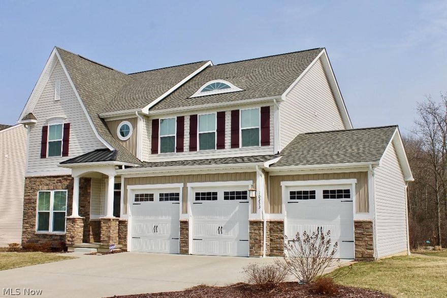 Better then new construction without the wait! This stunning Colonial has all the detailed finishes your looking for. Wide open floor plan with beautiful cherry Bordeaux kitchen cabinetry. Sleek granite counter-tops and all upscale stainless appliances. The kitchen,foyer and powder room all have tongue in grove dark wood floors. First floor laundry and back hall leads to the 3 car garage. The focal point is the dramatic 2 story great room with stacked stone fireplace and wall of windows all open to the gourmet kitchen and morning room. All four large bedrooms upstairs including the master have neutral colored walls and carpeting. Master is expansive enough for an additional sitting area and huge walk in closet. The master bath has granite counters, his and her sinks and ceramic flooring. Beautifully finished lower level offers a full bath, exercise room and a custom putting green with holes cemented into foundation. All high efficiency home with lots of natural light. Upgrades led ligh