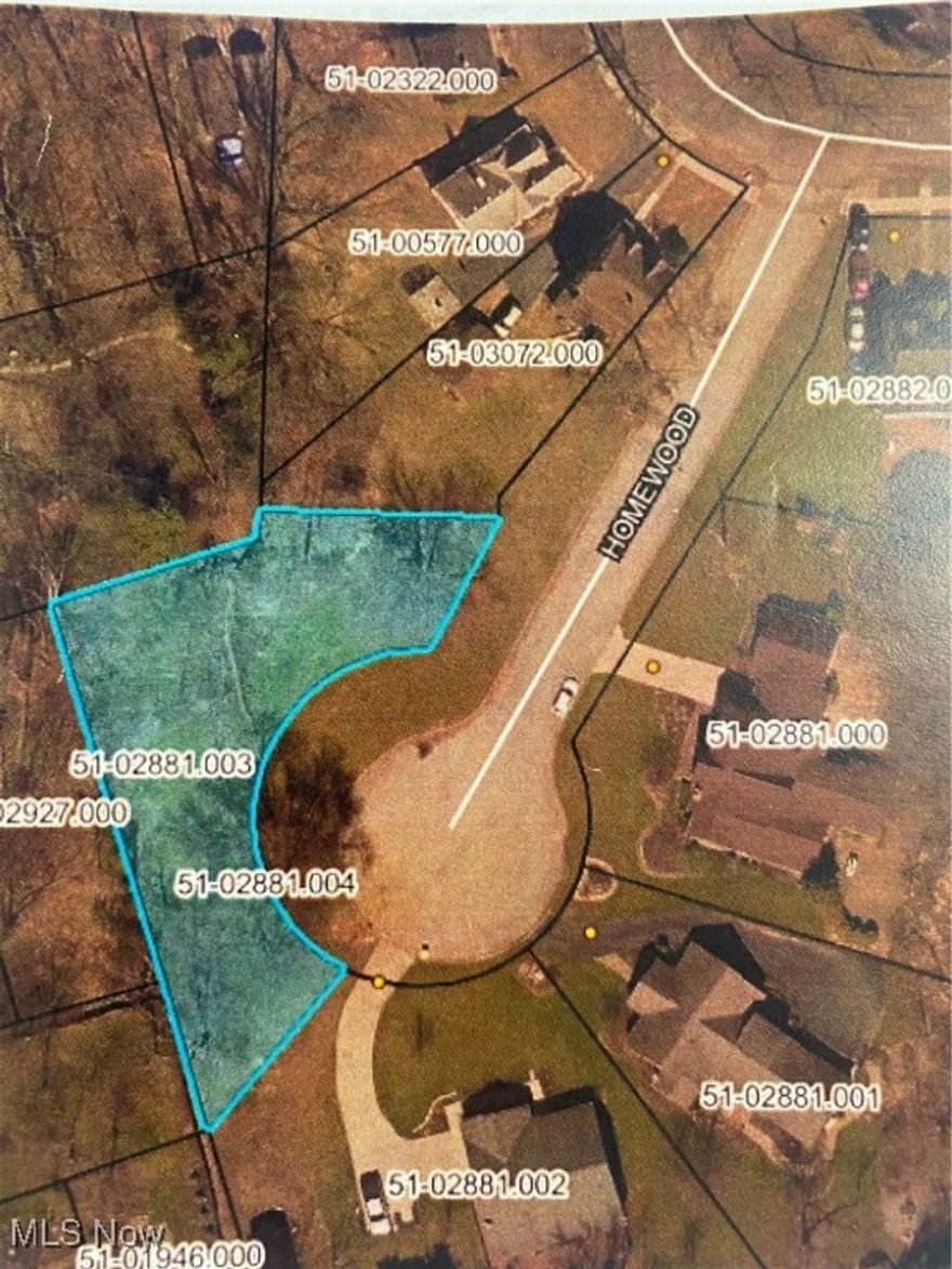 Building lot on a quiet cul-de-sac street. Partially wooded. Public water, public sewer and electric available.  Restriction on building..  must include a loft in the plan. Tax Abatement on a new build with the city.