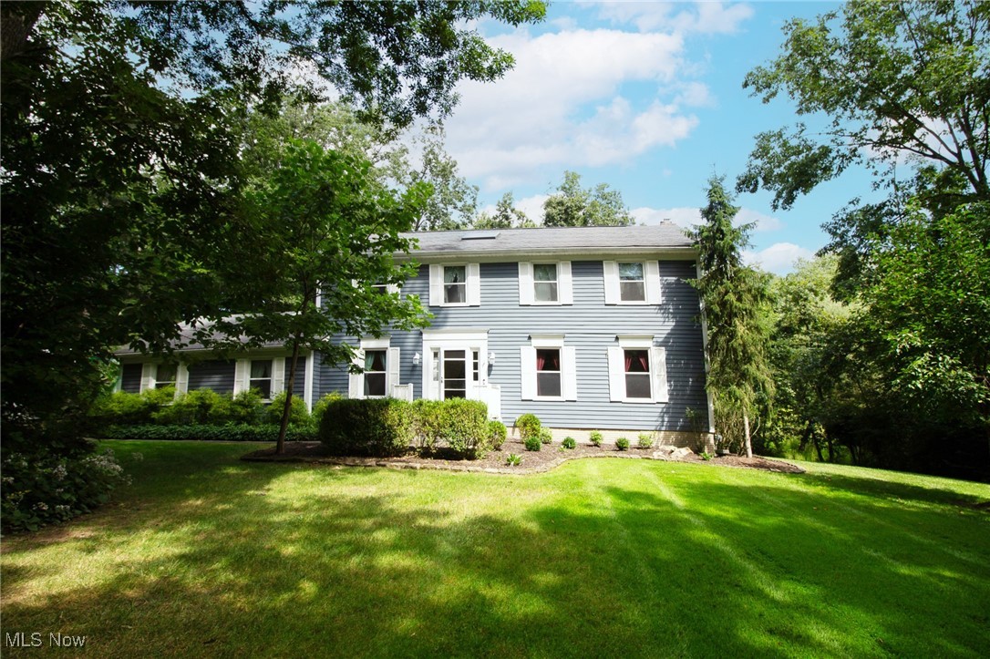 Outstanding Opportunity on 4.62 Acres, a splendid three (or four) Bedroom Custom Center Hall Colonial for you to call home. This home sits on one of the largest, park-like setting land lots, setback from the street and surrounded by wooded wonderland. Nearby is the Nature Preserve known for birdwatching and hiking. The home offers formal living room, dining room, spacious family room with a cozy fireplace with built ins and an open eat-in Kitchen that is sure to please. Convenient first floor powder room and laundry room on the first floor. Our Family Room offers a lovely stone fireplace and panoramic views of the private back yard. The loaded kitchen features a spacious center island cook top, Stainless Steel Appliainces, a pantry and abundant cabinets and counter spaces. Upstairs feature 3 spacious bedrooms and sitting room off Owners Suite, that once was a fourth bedroom and could be a fourth bedroom again. The Primary Bedroom sports a fireplace and elegant bathroom with walk in shower and shower and twin sink cabinet. Bedrooms upstairs share a hallway bath with tub shower and large, twin sink storage vanity. This home features a walk-out basement, and an oversized two car garage. All nicely landscaped and with beautiful foliage for abundant Spring and Fall colors. Deep Woods is an amazing location, exceptional values, and pride in ownership — there is no place like HOME! Updates include Windows 2022, HVAC and H20 Tank 2019, Electric Panel, Baths, floors and more can be done to make it special for you! We look forward to seeing you on Sunday from 12-2pm.