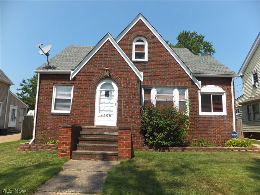 Zoned 2 family but set up as large single with in-law,BRICK,move-in condition,3/4 bedrooms,2 kitchens,appliances stay,updated 100amp electric box,glass block windows,lav/shower in bsmt,security system,newer roof,2 car garage,fenced yard