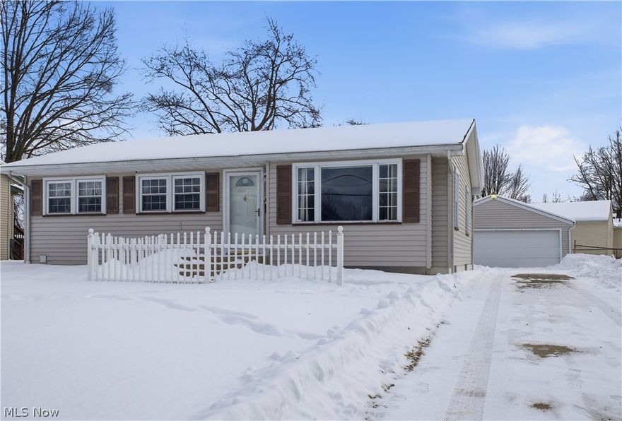 Home Sweet Home! This adorable 3-bedroom ranch home offers comfortable one-floor living. The spacious living room features a large picture window and hardwood floors, creating a bright and welcoming feel. The eat-in kitchen includes oak cabinetry, laminate flooring, and comes equipped with a stove, refrigerator, and dishwasher. There is even a handy panty located by the back door. 
All 3 bedrooms showcase hardwood floors and 2 of them have double closets. The full bathroom features a high-rise toilet, jetted tub with shower, and a linen closet for added storage.
The full basement adds great bonus space with a recreation room, bar area, and glass block windows—ideal for entertaining or relaxing. It has been waterproofed by Ohio State Waterproofing and includes a transferable warranty for $75 per year.
Additional updates include vinyl replacement windows and a roof that’s approximately 2–3 years old. Outside, you’ll find a detached 2.5-car garage and a fully fenced backyard, offering plenty of room for outdoor enjoyment. Move-in Ready, this is a  great place to call home! Call to make it yours today!