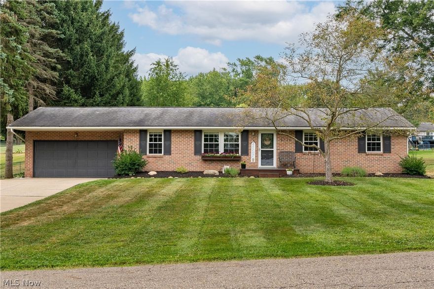 This family-friendly brick ranch sits on a .71-acre lot in North Canton CSD. The front porch welcomes you to this lovely bright and spacious home with lots of character throughout. This home is impeccably landscaped and has beautiful exterior lighting for an extra wow factor at night. A cozy great room invites you in with abundant natural light and a wood accent wall that brings warmth to the room. The open dining room features shiplap walls and sliding glass doors leading to the three seasons room. Perfect for entertaining friends and family the three seasons room has a a vaulted ceiling, a ceiling fan, and a TV. The backyard is ideal for enjoying warm summer nights featuring a fenced-in area with K-9 Turf, an oversized shed (13x11), and a patio with a firepit. The eat-in kitchen offers a large pantry, an extra deep double-sided stainless steel sink, stainless steel appliances, a breakfast bar, and a dining area with a first-floor laundry closet. The main floor is complete with generous 3 bedrooms and 1.5 baths including the master suite with a private entrance to the half bath. The finished basement offers a vast recreational room perfect for family nights and parties, a laundry area with a utility sink, and additional storage space. The attached 2-car garage completes the package. Great location nearby shopping and just minutes to the highway and Akron-Canton Airport. Recent updates include Furnace/ A/C, finished basement, front porch, firepit, and an access ramp to the shed. A must-see! Make an appointment for your private showing today!