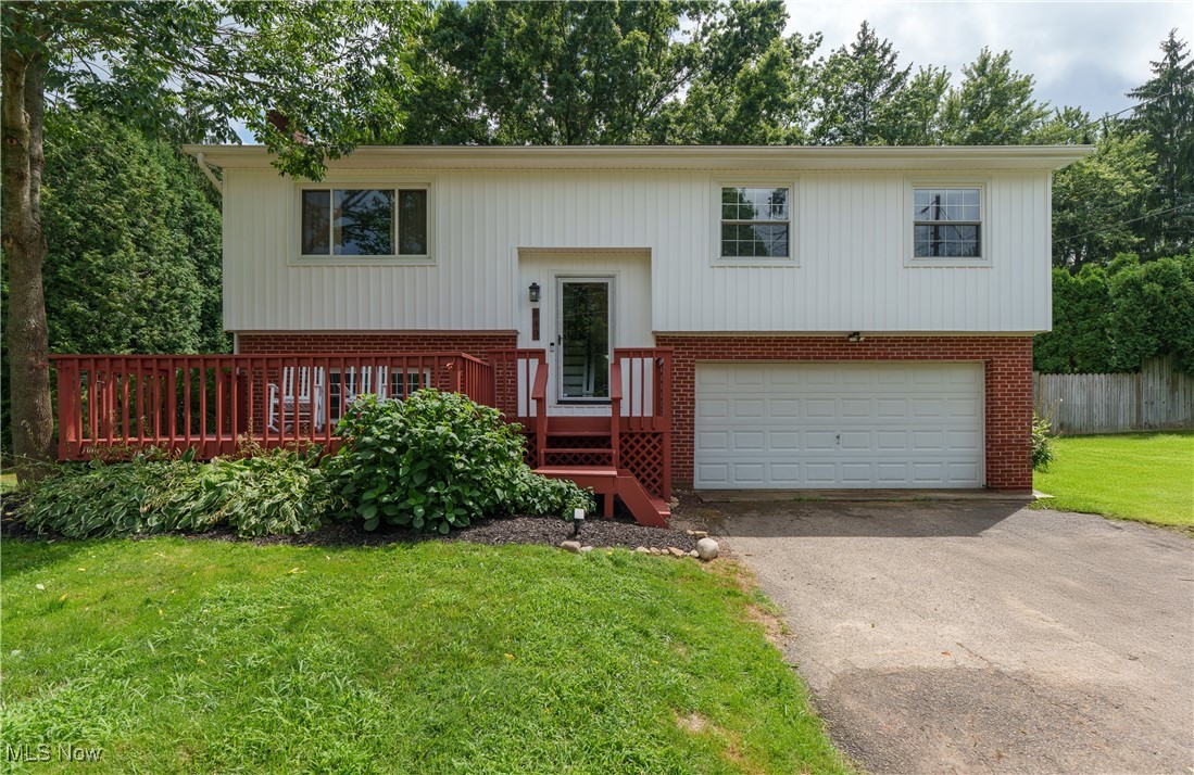 Step into this beautifully updated 3-bedroom, 2 full bath home offering over 1,400 sq. ft. of stylish living space. Set on a fully fenced-in lot with exceptional privacy, the backyard is a true retreat—perfect for kids, pets, or simply relaxing by the newly installed fire pit. The exterior has been meticulously maintained and upgraded, featuring a new roof and siding (2019), brand-new water heater (2024), updated HVAC and furnace (2023), and a full iron filtration/purifier system. Leaf guards, fresh mulch, and a professionally leveled and landscaped backyard (2025) round out the home's curb appeal. The welcoming front porch has been recently re-stained, giving this home that extra touch of charm. Inside, enjoy an open-concept main living area with a bright and airy flow between the kitchen and living room. The kitchen has been refreshed with refinished cabinets, counters, backsplash, a sleek modern vent hood/microwave combo, new garbage disposal (2025), and a refrigerator (2024). Luxury vinyl plank flooring (2022) flows throughout the upper level, complemented by freshly painted baseboards and trim. Both bathrooms have been updated—one fully renovated in 2024 with new vanity, shower, and toilet, and the other refreshed in 2025. All three bedrooms are generously sized and just waiting on your finishing touches. Don't miss your opportunity to own this turnkey home that combines modern updates with thoughtful design and a private outdoor space perfect for entertaining or unwinding.
