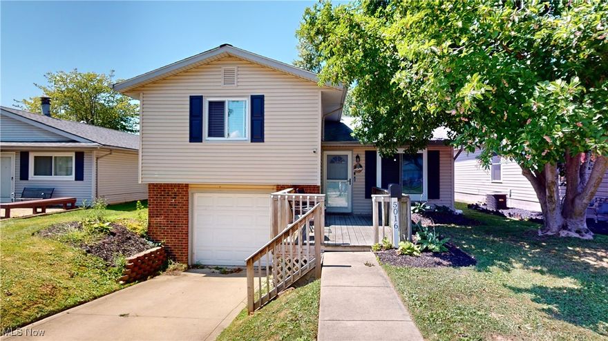 Move-In-Ready Split Level in Mentor Headlands!  This lovely home is has neutral decor and offers open concept design with the living room/kitchen combo. The kitchen has a breakfast bar, trendy navy cabinets, stainless steel appliances,  and sliders that lead to the patio.  The second floor has three bedrooms, a hall closet and full bath.  The walk-out, lower level has a family room, laundry space and access to the one car garage.  Out back there is large, fully-fenced yard, shed, patio and hot tub that will transfer with the property.  The basement has been waterproofed and has a lifetime transferable warranty.  All appliances stay and seller is offering a home warranty!   Close to many city parks and the beautiful Mentor Lagoons.  Check out the 3D tour and call for your showing today.