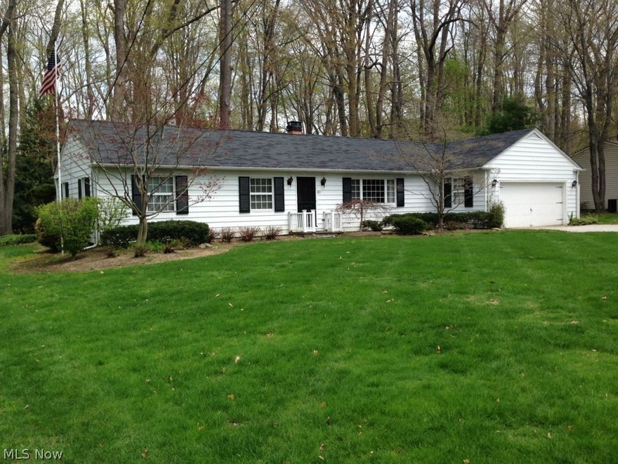 Welcome to this beautiful 4 bedroom 1778 sq. ft.  ranch home sitting on a panoramic treed lot.  Large front yard and cozy backyard with exterior deck off of the house, which boasts a private jacuzzi!  Backyard includes a fire pit, patio furniture and park bench situated in a park like setting.  Great for family events!!  This home features a cozy family room with a cute wood burning stove/fireplace that leads to a large spacious Master Bedroom with a beautiful view. The eating area/dining room with newer carpet has a sliding door leading out to the deck and scenic backyard.  This home offers a large kitchen area, great cabinet space and includes all appliances!.  There are 3 additional bedrooms and full bath located near the opposite end of the house.  Bonus 1/2 bath located on first floor with stackable washer and dryer!  This affordable ranch offers a lot for the price and is a fabulous starter home, some updating will be needed. Ideal location, near schools, library, stores and hwy.