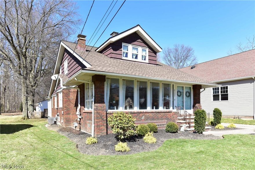 Classic brick Craftsman Cape Cod located in desirable Independence!  Recently fully restored and renovated. A perfect blend of modern and stylish finishes meets 1940s charm and authentic Craftsman details! From the refinished hardwood floors, to the carved mouldings, leaded glass built-ins and window seat, wrapped in a cool and tranquil color palette, this 4 bedroom 2 full bath home features over 2400 sqft plus a full finished basement!  A spacious entry, formal living room with gas fireplace and dining room lead to a stunning eat in kitchen with white cabinets, granite counters, and a full suite of high end stainless appliances!  Just off the kitchen is a sunny vaulted family room with beamed ceiling and wall of windows that overlooks the deck and 338' treed lot!  Rounding out the first floor are 2 bedrooms and elegant full bath.  Upstairs find the third bedroom, sparkling full bath and master bedroom complete with sitting area!  A full finished basement features a second family room,