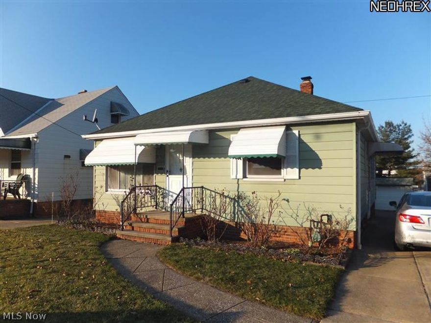 Excellent Buy! Aluminum sided ranch,newer windows,newer roof,2 baths,central air,glass block windows,rec room w/bar,2 car garage