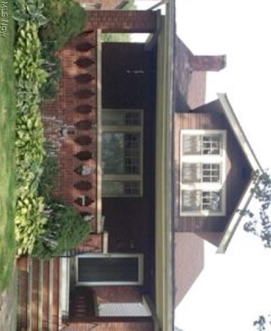 Classic brick home on desirable western Lakewood street abounds with character and charm.  Master bedroom is your personal oasis with private half bath and loads of storage.  Walk through to bedroom #4 featuring beautiful wood flooring.  Formal dining room offers rich woodwork, built-in window seat and china cabinet.  Home workshop located in refreshingly clean airy basement.  Relax and enjoy the day from the full front porch.  (Back porch also).  2 1/2 car garage.  This home has had meticulous maintenance.