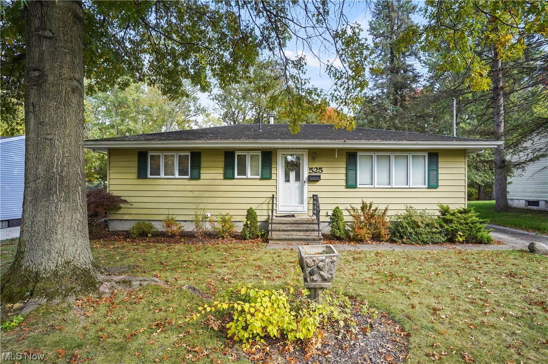 525 Harvey St, Kent, Ohio 44240 is a beautiful Ranch home on the Northeast section of Kent just a few blocks from "Front Campus" of Kent State University with bus service. Easy access to downtown with many eateries, shopping, parks nearby and close to Walls Elementary School. 360 square foot addition has been added with a kitchenette & its own bathroom and was used as an elder generation complete suite. The gorgeous kitchen was completely updated & includes wonderfully functional plan w/ breakfast bar, beautiful countertops & cabinetry w/ all the goodies. Kitchen appliances included & laundry washer & dryer can stay if Buyer wants. The main home full bathroom was fully remodeled as well and ready for the next Owner with a well thought out remodel. The windows were replaced in the past 10 years, HVAC is serviced annually & warranted pest control plan. Private backyard abuts woods w/ plenty of wildlife including squirrels, birds & deer. Neighborhood w/ great neighbors, lots of walking, exercise & friendly people. True Dining Room w/ views to rear yard & opens to both the kitchen & the Living Room with picturesque windows & front entry door. There is a Bonus Room that was used as a Den that was a bedroom & is now the joining Flex Room to additional Living Suite, PERFECT for multigenerational co-habitating or as your huge Primary Bedroom Suite w/ its own 2nd full access from rear patio! Huge basement for great possibilities! Sale settles an Estate & includes 1 year warranty.