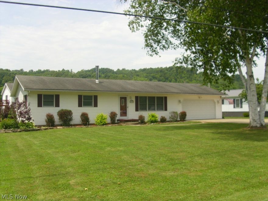 Great house  just north of Malta on St Rt 669. There are 3 bedrooms with beautiful oak flooring and there is 1 bathroom. The kitchen features plenty of cherry cupboards and all updated appliances. Off of the dining area, through the sliding patio doors is a huge deck for enjoyment and entertaining. The living room is carpeted with a gas fire place, which can be a wood burning fireplace. The house is 200 amp electric with a nice attached 2 car garage with storage space above garage. The yard is nicely landscaped and has a 12x16 shed in back yard. The wood flooring is  throughout the whole house if you choose to take up carpeting and vinyl flooring. The property does require flood insurance .City water is available.
