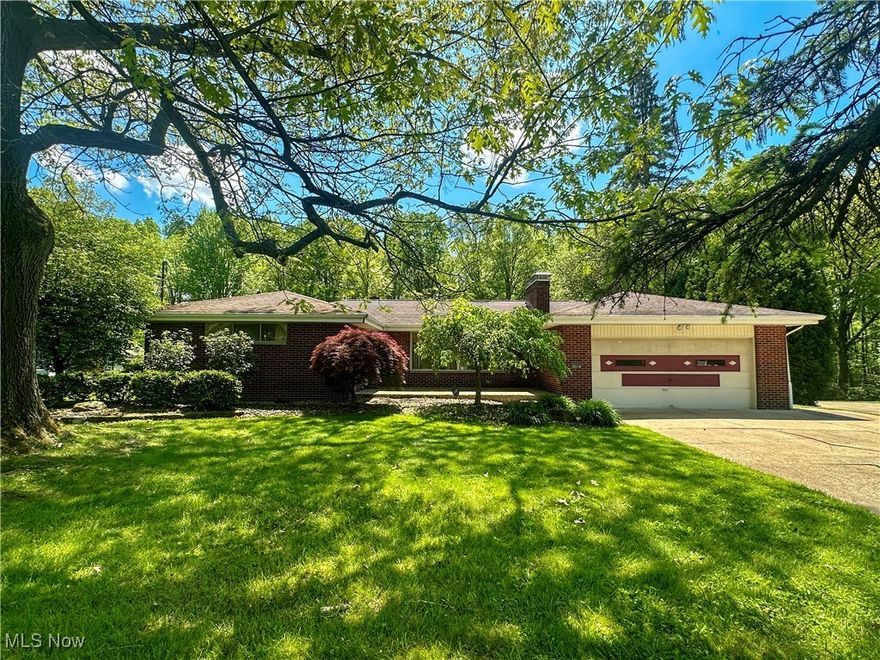 Welcome to this charming 3-bedroom, 3-bathroom raised ranch, offering ample space and versatility on a generous .9-acre lot. The home features a spacious 2-car attached garage, providing plenty of room for vehicles and storage. A cozy sunroom brings in abundant natural light, while the deck offers a perfect spot for outdoor gatherings or quiet relaxation. The finished basement boasts a large, open living area with a cozy gas burning fireplace, creating a perfect space for a family room, entertainment, or a recreation area. Additionally, you'll find several bonus rooms, ideal for extra bedrooms, office space, or creative spaces. For those who enjoy working with their hands, the workshop area is a standout feature, and the walk-out patio adds extra convenience. With a functional layout and solid structure, this home is ready for your vision to transform it into something truly special. Seller is offering a Cinch Home Warranty for your peace of mind. Don’t miss out on this chance to own a home with so much potential!