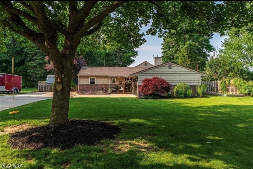 Welcome to this inviting 4 bedroom, 2 bath home in Mentor, offering the perfect blend of comfort, space, and outdoor fun. From the moment you step inside, you'll feel how easy it is to imagine life here. The kitchen will excite you to want to cook in it with concrete countertops and an island with carming old fashion bar stools. The heart of the home is the expansive great room, gatherings, or simply spreading out and enjoying the extra space. A separate living room with a cozy fireplace adds warmth and charm, perfect for relaxing after a long day or hosting friends with ease to watch a movie on the movie screen that will be staying with the home. Step outside and discover a fully fenced backyard designed for enjoyment. Cool off in the sparkling pool, unwind around the fire pit, hang out in the treehouse or take advantage of the RV cement pad, a rare and valuable bonus. With .34 acres, there's plenty of room for play, pets, gardening, or creating your own outdoor oasis. This home offers the lifestyle so many buyers are looking for: generous indoor living, great outdoor amenities, and a location that keeps you close to everything Mentor has to offer. Come see why this property is the perfect place to settle in and make it your own.
