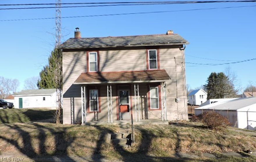 This colonial home in the small town of New Waterford offers semi modern kitchen with dining room, living room plus first floor family room and 3/4 bath. Traditional second floor with 3 bedrooms and full bath. Rear enclosed porch or mud room. This home is SOLD AS IS. No offers will be reviewed for 7 days, first 21 days have to be owner occupants only.