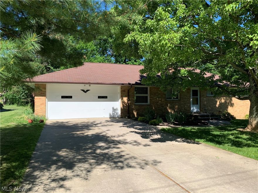 It's the solid, all-brick ranch that you've been waiting for on a newly paved, private street with a spacious, scenic back yard.  Move in ready and well-maintained!  Freshly finished hardwood floors throughout.  Master Bedroom with a full Master Bath.  Living room with large picture windows walks out to a sunroom.  Newer finished Lower level family room, lots of storage, laundry and bonus room that walks out to back yard.  Lots of green space to toss the football and still enjoy the seasonal, scenic views of a ravine/creek where the sun sets.  All big ticket items are in great shape and/or updated and even a few smart home features!